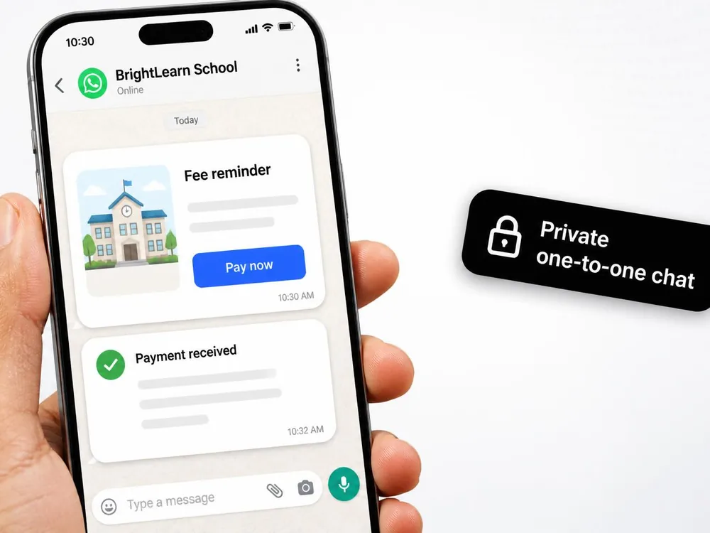 Hand holding a phone with a private WhatsApp chat from a school showing a fee reminder, a Pay now button and payment receipt.